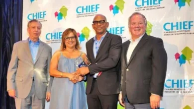 CHIEF - Paul Collymore of The Landings Resort & Spa in St. Lucia is congratulated by (from left) CHTA's Frank Comito, Patricia Affonso-Dass and Bill Clegg.