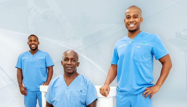 Black Dentists in South Florida - Dr. Roger Phanord and his twin sons, Drs. Kevin and Kyle Phanord