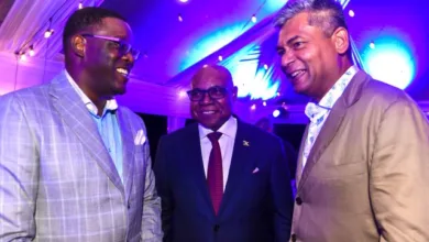 Boosting Internet Connectivity in Jamaica - Minister of Tourism, Hon Edmund Bartlett (centre) shares a light moment with Country Manager of Flow Jamaica, Stephen Price and Chief Executive Officer of Flow’s parent company, Liberty Latin America (LLA), Balan Nair