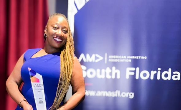Founder and CEO Lasana Smith receives the "Digital Marketing Campaign of the Year" award