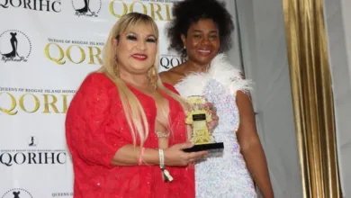 Dancehall Queen Carlene Smith accepting a special award in honor of her sister and fellow dancer Pinky from Laurell Nurse, founder of Queens Of Reggae Island Honorary Ceremony at the Pegasus hotel in Kingston ,Jamaica on March 22. Pinky died in July 2023