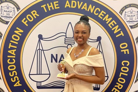 Jamaican Danette Mahabeer-Turner with her Rosa Parks Power of One Award, presented to her in March by the Paducah-McCracken County chapter of the National Association for the Advancement of Colored People (NAACP) in Kentucky.