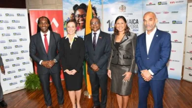 Minister of Foreign Affairs and Foreign Trade, Senator Kamina Johnson Smith ( second from left), pauses for a photo opportunity with State Minister, Alando Terrelonge (left) and Jamaica Diaspora Conference legacy sponsor representatives (from left): Courtney Campbell, president and chief executive officer of VM Group; Leesa Kow, managing director, JN Bank and Gabriel Heron, head, business transformation, GraceKennedy.
